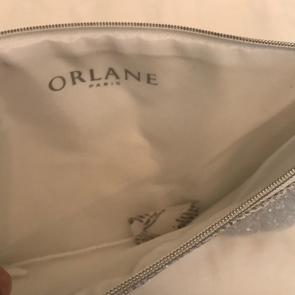 NWOT Orlane Paris silver sparkly cosmetic pouch